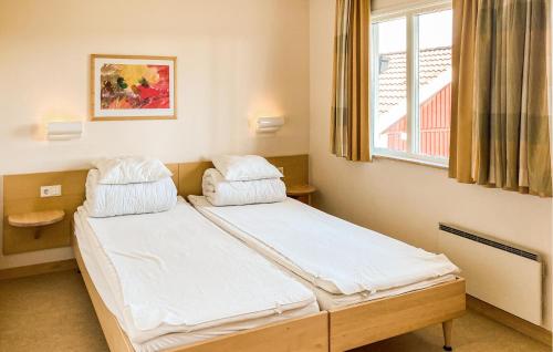 Ένα ή περισσότερα κρεβάτια σε δωμάτιο στο Pet Friendly Home In Hok With Wifi