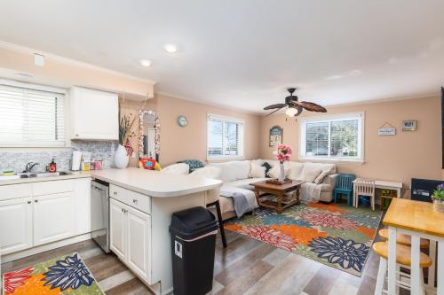 a kitchen and living room with a couch at North Ocean city newly Remodeled in Ocean City