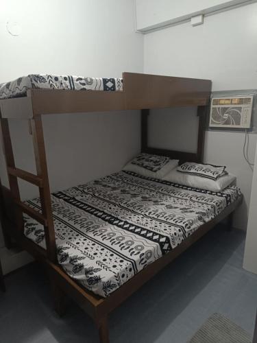 Postel nebo postele na pokoji v ubytování Felipas City Center Budget Room Home Stay