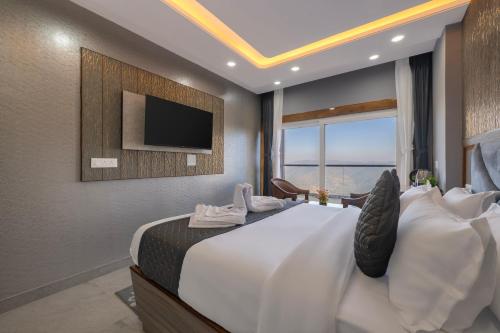 Μια τηλεόραση ή/και κέντρο ψυχαγωγίας στο High Rise Inn Kufri