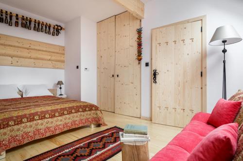A bed or beds in a room at Holiday Home Patchwork Barn