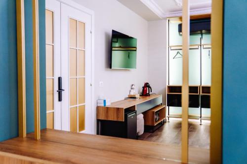 Kuchyň nebo kuchyňský kout v ubytování NS Luxury Suites