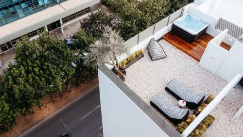 Posezení v ubytování Num Suites & Lofts Athens