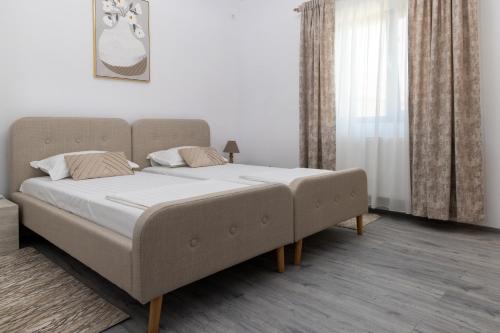 Postel nebo postele na pokoji v ubytování Varer