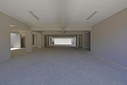 an empty hallway of an empty office building at Apartment 2-bedroom #3 Leetch Views in Cape Town