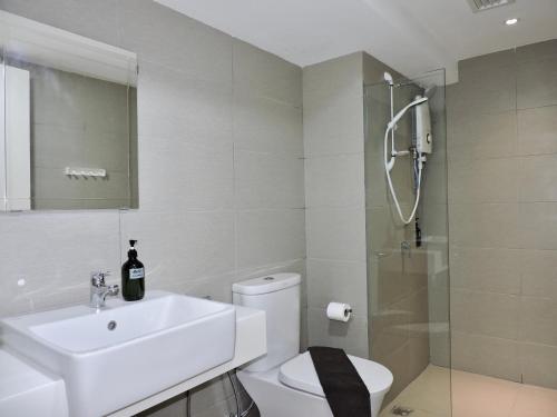 a bathroom with a toilet and a sink and a shower at Ekocheras Residence KL Homestay by HomePeace in Kuala Lumpur