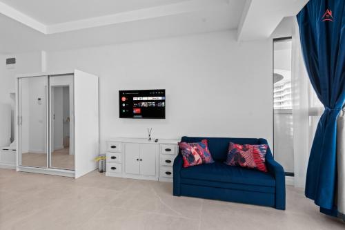 Et tv og/eller underholdning på Studio axxis nova seaside-Parcare GRATIS