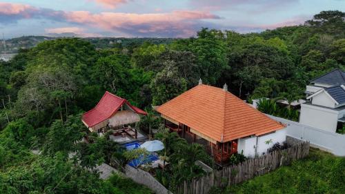 an overhead view of a house with an orange roof at Ocean View Private Villa in Nusa Lembongan