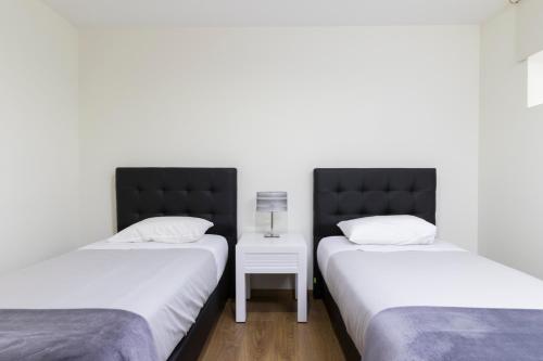 Postel nebo postele na pokoji v ubytování Casa da Pousada