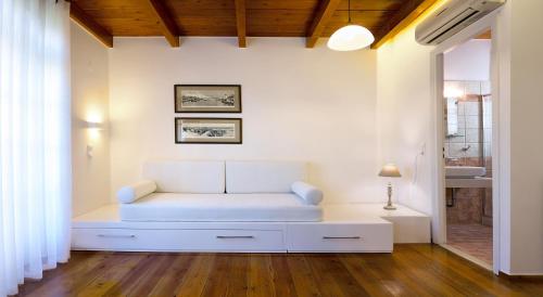 Postel nebo postele na pokoji v ubytování Ontas Traditional Hotel