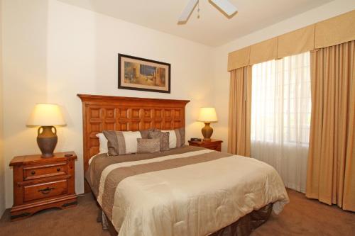 A bed or beds in a room at La Quinta Vacations Rental