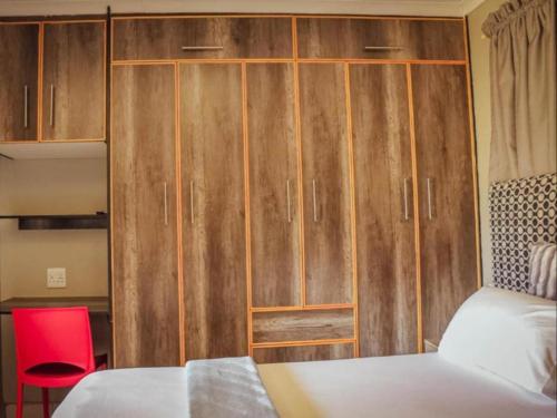 PW Heights Private Guest Houseにあるベッド