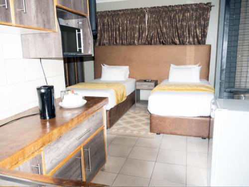 PW Heights Private Guest Houseにあるベッド