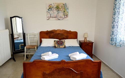 Ένα ή περισσότερα κρεβάτια σε δωμάτιο στο Villa Vigles