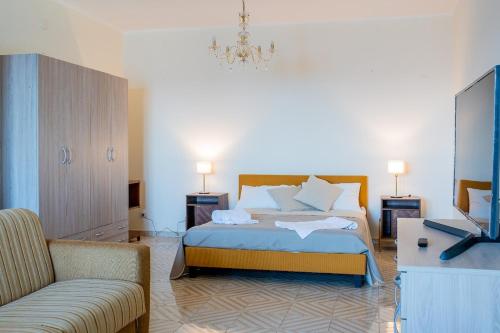 Ένα ή περισσότερα κρεβάτια σε δωμάτιο στο Casa Maggio