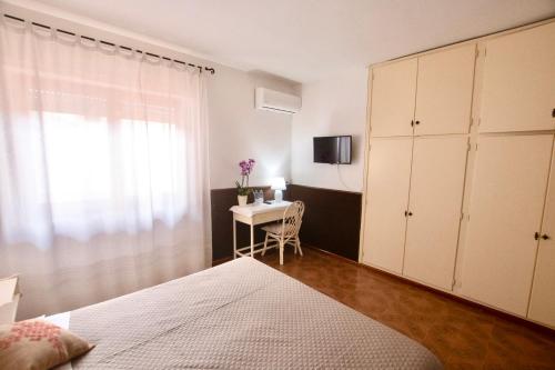 TV a/nebo společenská místnost v ubytování Albergo Ristorante Locanda Rosella
