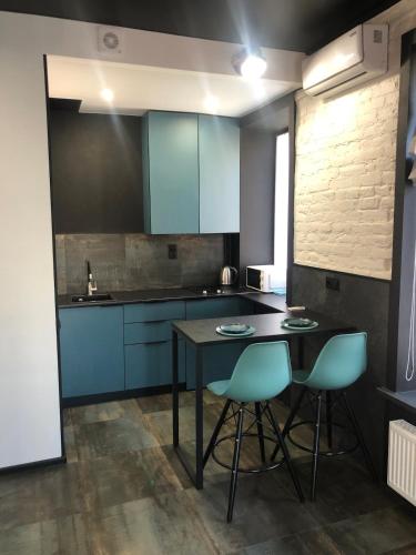Η κουζίνα ή μικρή κουζίνα στο Loft next to the city center