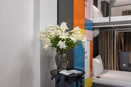 Ένα ή περισσότερα κρεβάτια σε δωμάτιο στο Ja Costa Hostel