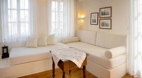 Postel nebo postele na pokoji v ubytování Ontas Traditional Hotel