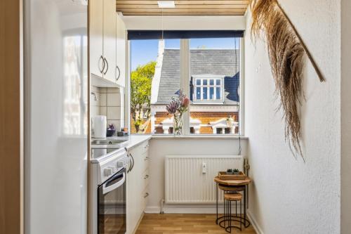 Kuchyň nebo kuchyňský kout v ubytování Hotel Ringkøbing