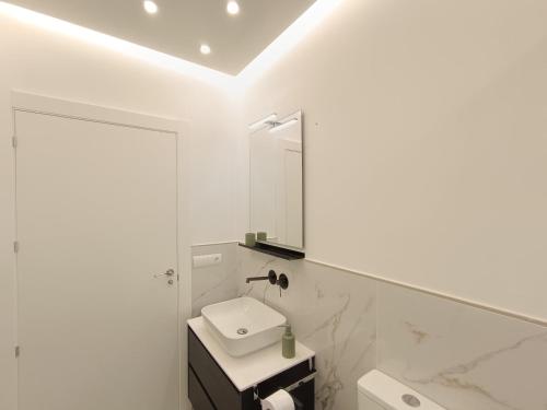 Ένα μπάνιο στο Hotel Apartamento 3 Lobitos
