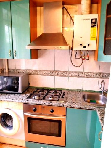 Η κουζίνα ή μικρή κουζίνα στο Apartment in the center