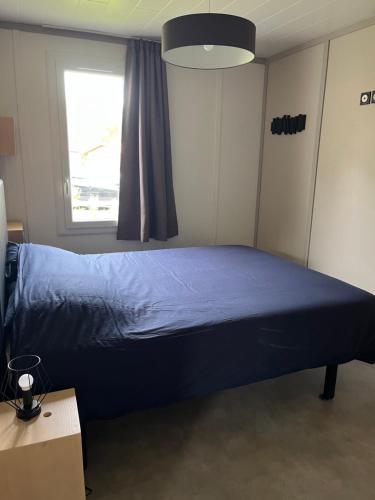 Postel nebo postele na pokoji v ubytování CHALET 10 Clos de Gascogne