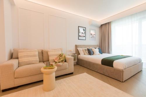 Postel nebo postele na pokoji v ubytování Cortina North - Skyline Studio with City Views