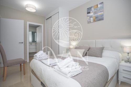 Giường trong phòng chung tại Casa Playera Ivan Luxury Homes 5ªPlta Norte 1ªLinea