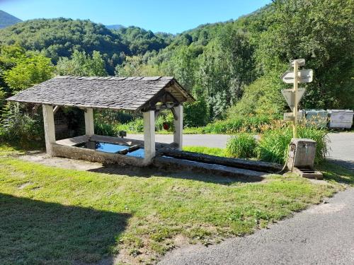 a gazebo sitting on the side of a road at Gîte Les Lutins in Biert