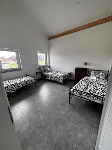 Postel nebo postele na pokoji v ubytování Bade Apartments Steinhöring