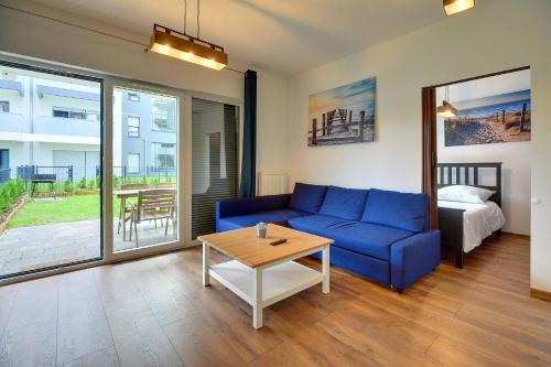 Bright Sun Seasons 24 Apartments in Pogorzelica Close to the Beach with Parking and Balcony by Noclegi Renters