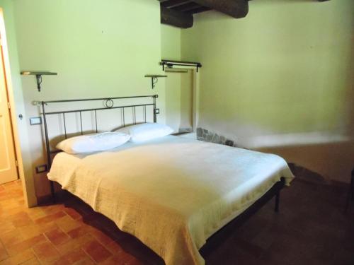 Postel nebo postele na pokoji v ubytování Le Case Gialle Resort