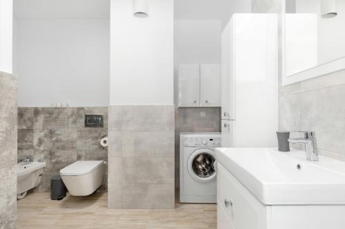 Kúpeľňa v ubytovaní Osiedle Bursztynowe III by Jantar Apartamenty Kołobrzeg