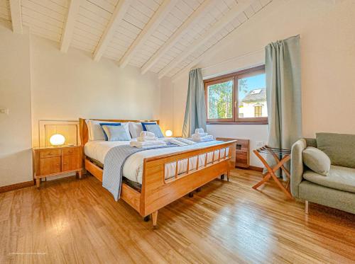 En eller flere senge i et værelse på Villa Corelli - Parking and Exclusive garden