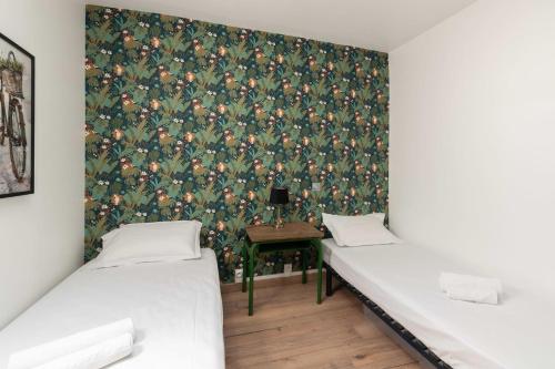 En eller flere senge i et værelse på Ker des Halles - 600m centre - 300m port