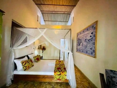 Postel nebo postele na pokoji v ubytování La bonne Aventure