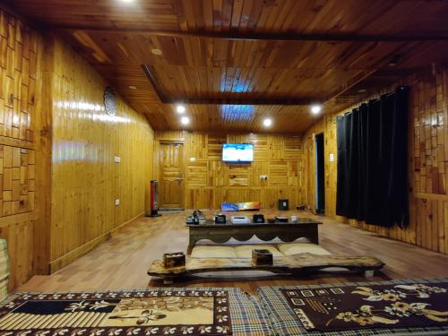 TV a/nebo společenská místnost v ubytování Flipsyde Retreat