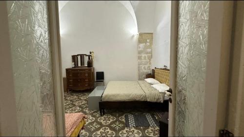 Postel nebo postele na pokoji v ubytování Casa Scarciglia