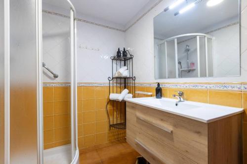 a bathroom with a sink and a shower at Casa Sánchez. Old Town Marbella in Marbella