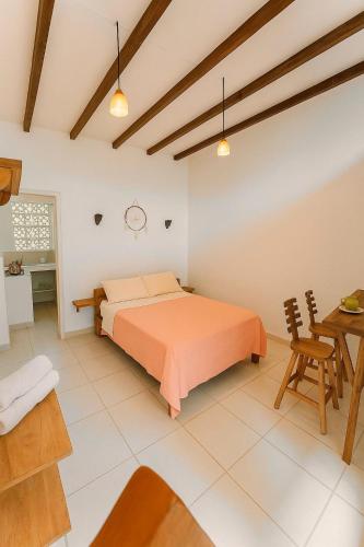 Postel nebo postele na pokoji v ubytování Apartaestudio privado cerca a la playa