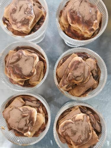 a group of muffins in paper muffin wrappers at Hôtel de la Palmeraie in Bujumbura