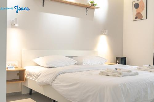 Apartments Joanaにあるベッド