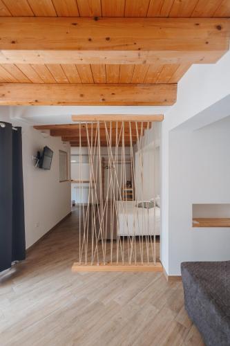 a room with bamboo sticks hanging from the ceiling at La Casa Di Pinocchio in Enna