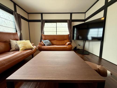 Televisyen dan/atau pusat hiburan di 小樽しおかぜ亭は海辺の一戸建で過ごす特別な時間で観光拠点にも最適なロケーション