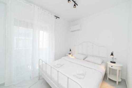 Ένα ή περισσότερα κρεβάτια σε δωμάτιο στο Anastasia Residential Complex