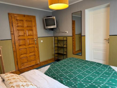 Postel nebo postele na pokoji v ubytování Sadyba U Olgy