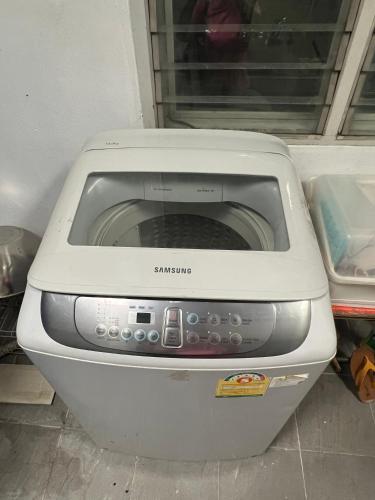 a microwave sitting on top of a counter at FirstFloorDormA in Ban Nong Khwang Tawan