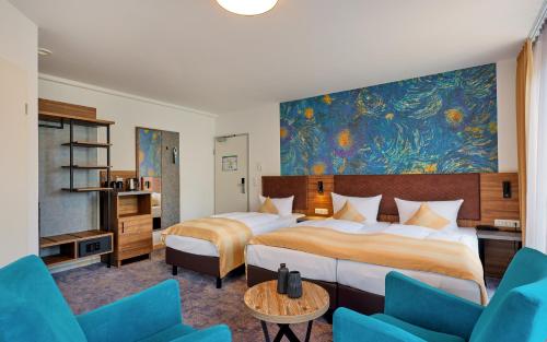 Katil atau katil-katil dalam bilik di Trip Inn City Hotel Giessen