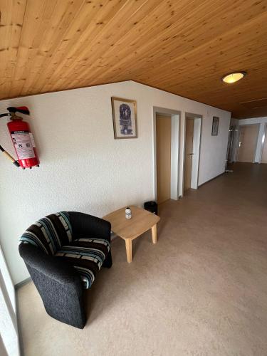 a living room with a couch and a table at Hospezi Santa Maria in Platta